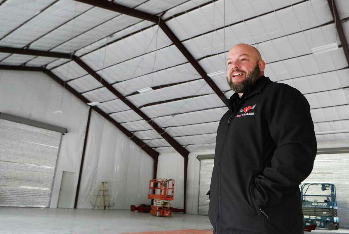 Justin Coggins, executive director of God's Garage talks about the progress the nonprofit has made, including the nonprofit’s new, 10,000 square-food facility, Tuesday, Nov. 15, 2022, in Conroe. The non-profit ministry organization provides vehicles to signal mothers, widows and wives of deployed military members.