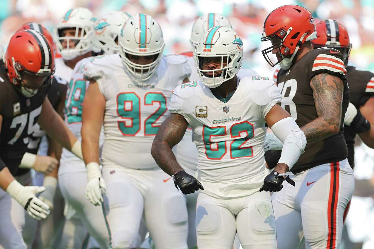 MIAMI GARDENS, FLORIDA - NOVEMBER 13: Elandon Roberts #52 of the Miami Dolphins reacts after stopping a run in the first quarter of the game against the Cleveland Browns at Hard Rock Stadium on November 13, 2022 in Miami Gardens, Florida.