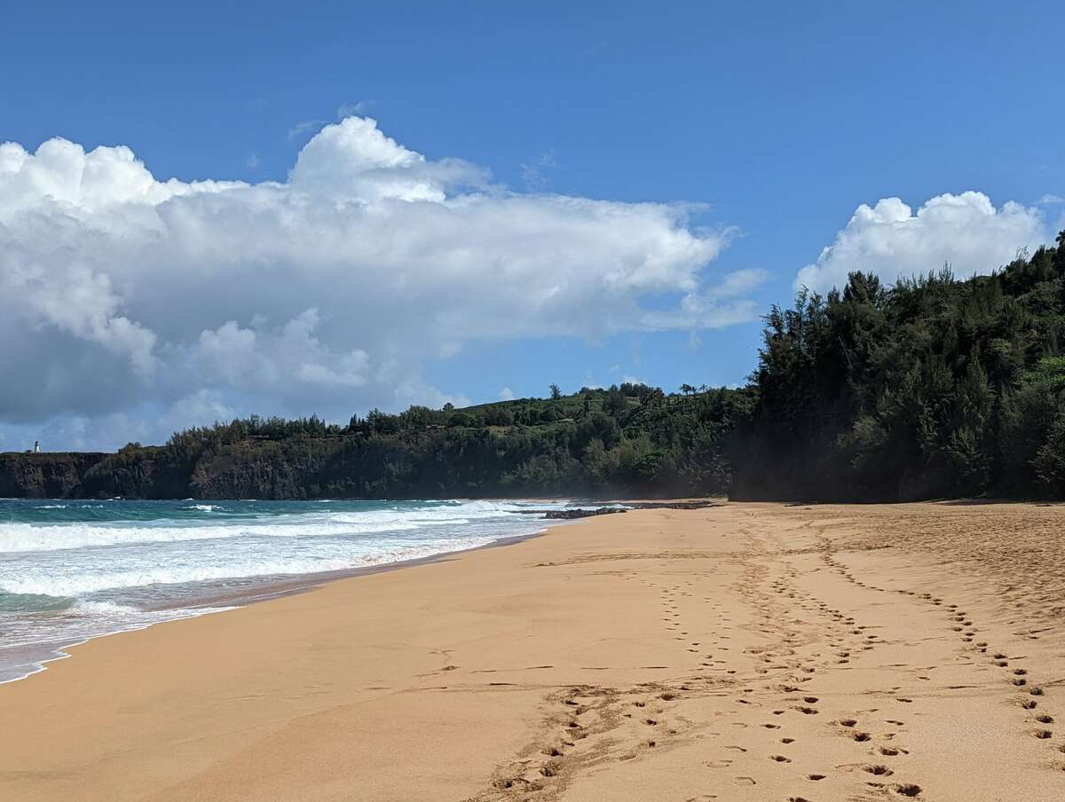 A view of the isolated and charming "secret" Kauapea Beach in Kauai.