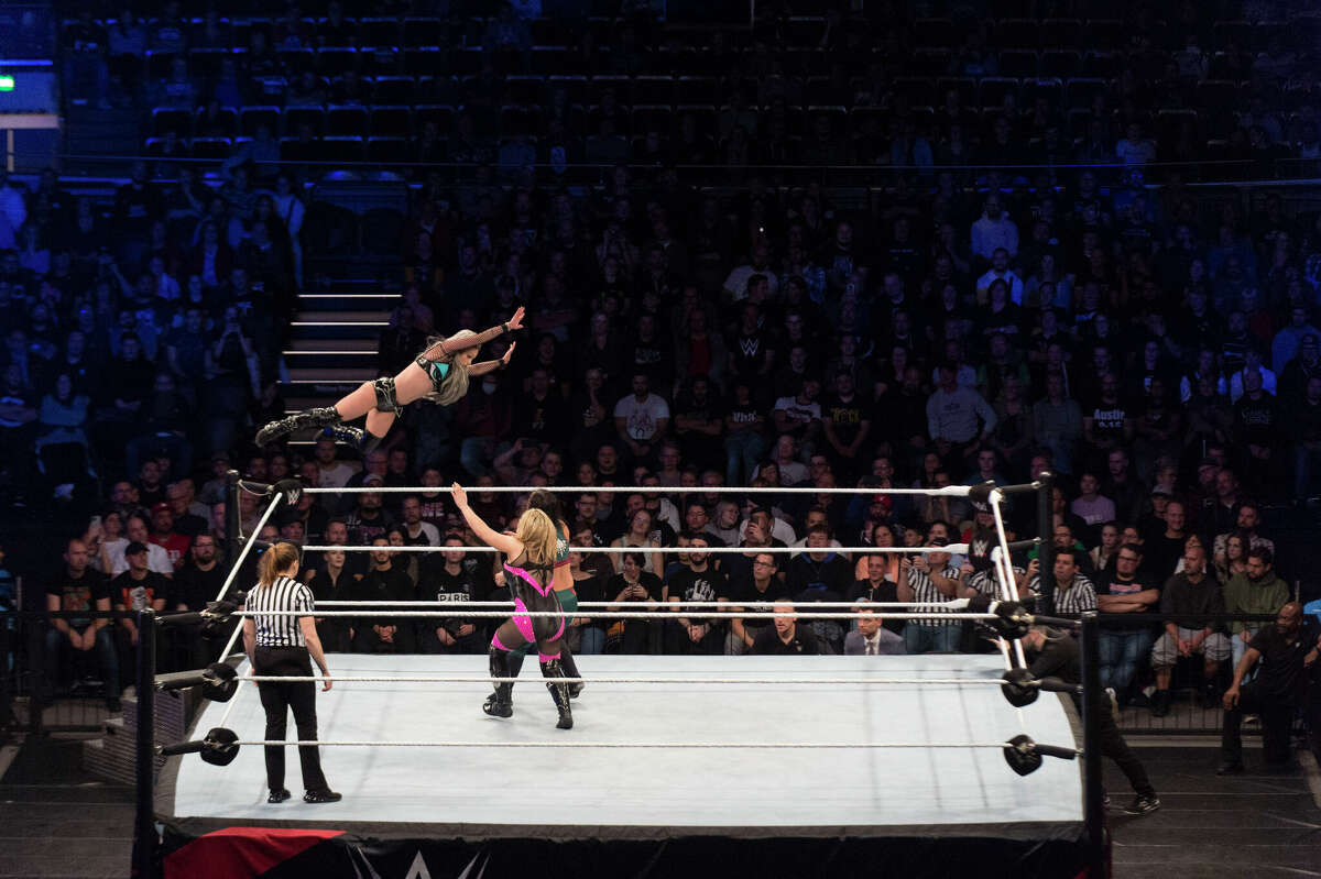 DORTMUND, GERMANY - NOVEMBER 01: Natalya, Shayna Baszler and Liv Morgan compete in the ring during the WWE Live Show at Westfalenhalle on November 1, 2022 in Dortmund, Germany. (Photo by Marc Pfitzenreuter/Getty Images)