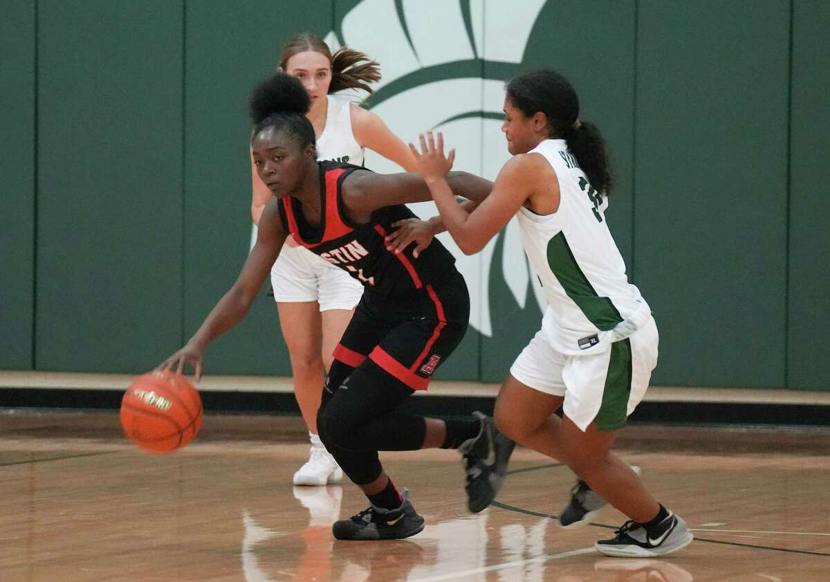 Fort Bend Austin’s Andrea Sturdivant (1) steals the ball from during the half of game action at Stratford High School on Tuesday, Nov. 15, 2022 in Houston.
