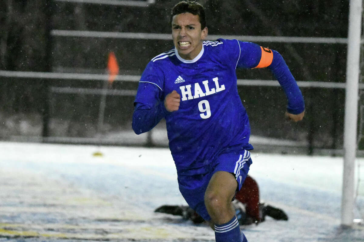 Hall's Lucas Almeida celebrates after scoring the game-tying goal in the second of the Class LL boys soccer semifinal between Hall and Norwalk at Municipal Stadium, Waterbury on Tuesday, Nov. 15, 2022.