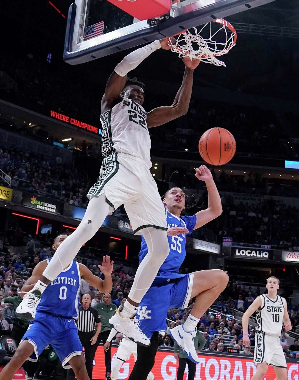 Michigan State center Mady Sissoko (22) scores over Kentucky forward Lance Ware (55) during overtime of an NCAA college basketball game, Tuesday, Nov. 15, 2022, in Indianapolis. (AP Photo/Darron Cummings)