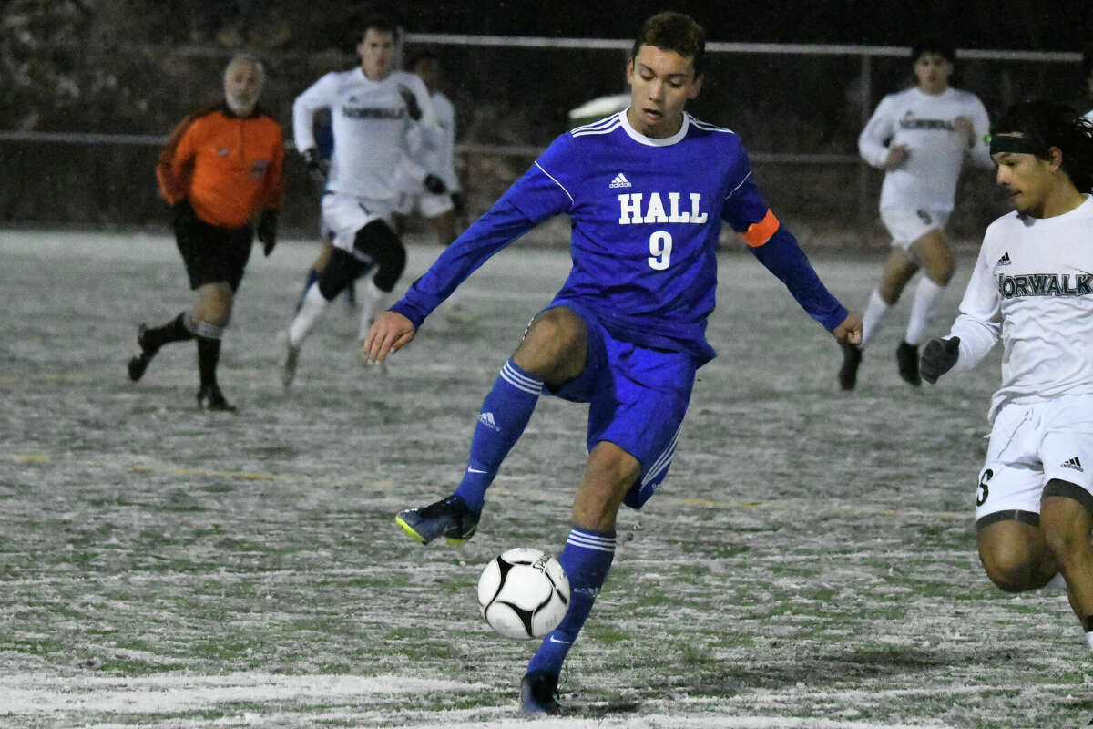 Hall's Lucas Almeida settles the ball during the Class LL boys soccer semifinal between Hall and Norwalk at Municipal Stadium, Waterbury on Tuesday, Nov. 15, 2022. Almeida was named the National Player of the Year by the United Soccer Coaches.