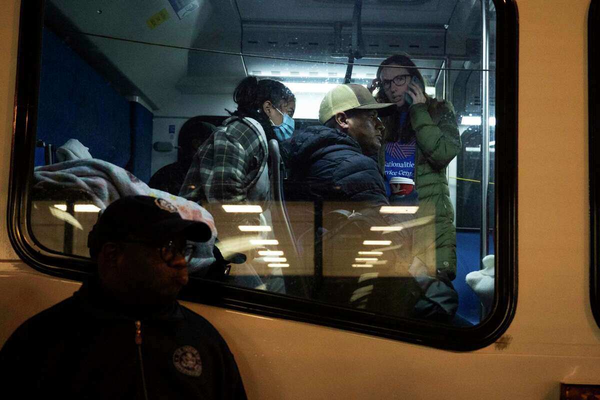 Migrants dispatched by Texas Gov. Greg Abbott arrive near the 30th Street Station on Wednesday morning, November 16, 2022, in Philadelphia.