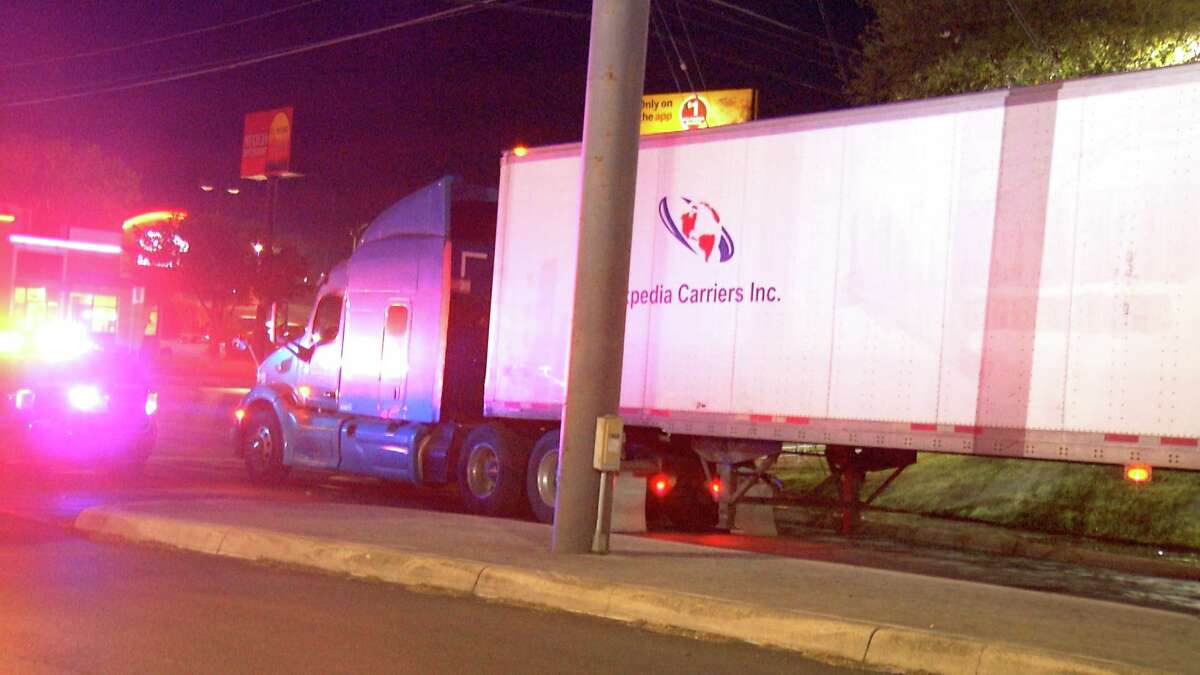 A man has died after he was ran over by a 18-wheeler truck he was hiding in, police said.