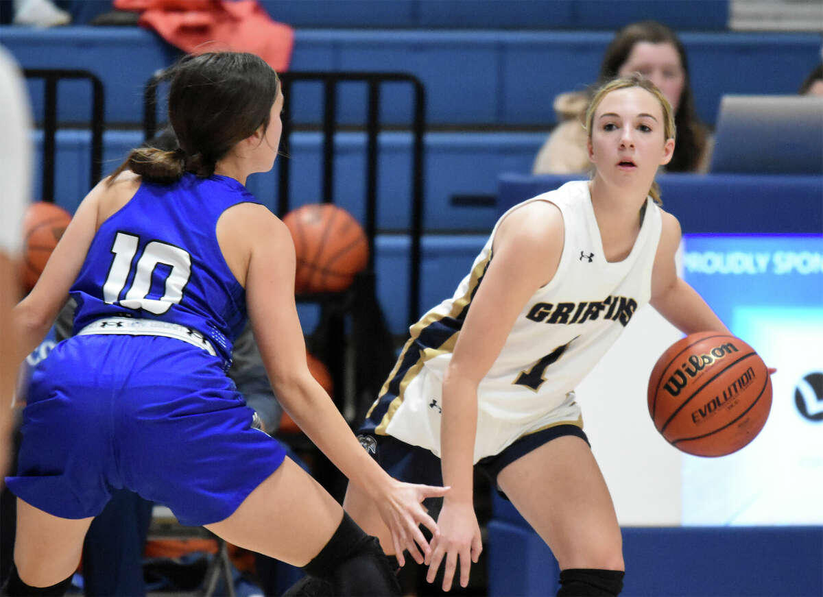 Father McGivney's Mary Harkins sets up the offense against Greenville in the second half of the first round of the Columbia Tip-Off Classic in Columbia.
