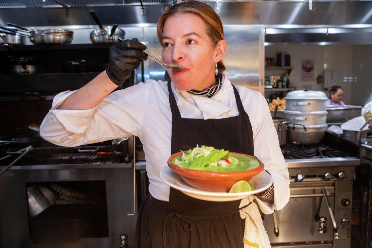 Bombera chef Dominica Rice-Cisneros tastes their latest batch of pozole, on Monday, Nov. 14, 2022.
