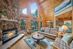 Can you guess the price of this log cabin in Schroon Lake?