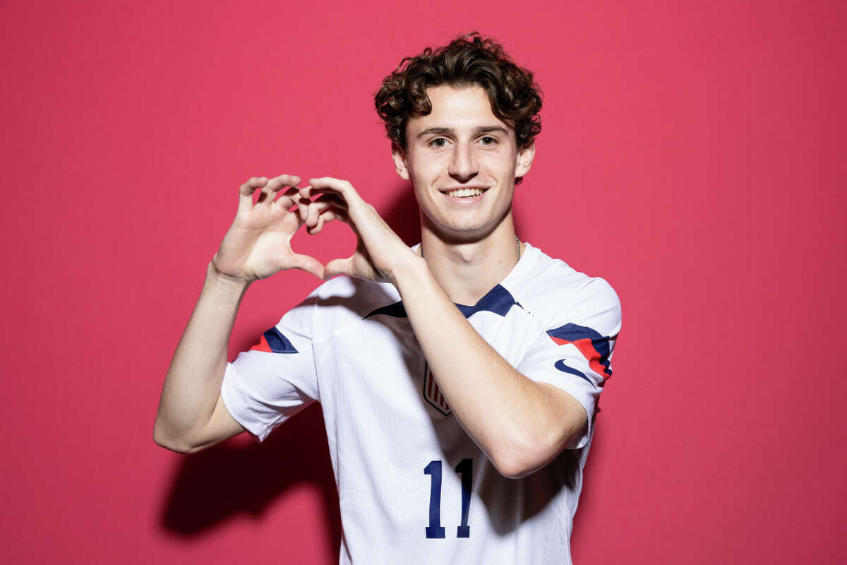 DOHA, QATAR - NOVEMBER 15: Brenden Aaronson of United States poses during the official FIFA World Cup Qatar 2022 portrait session at on November 15, 2022 in Doha, Qatar. (Photo by Patrick Smith - FIFA/FIFA via Getty Images)