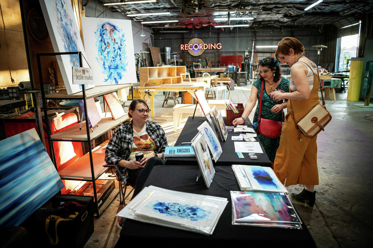 Artist Leslie Roades sells her artwork during a block party in the Second Ward in Houston, Texas on Saturday, November 5, 2022. 