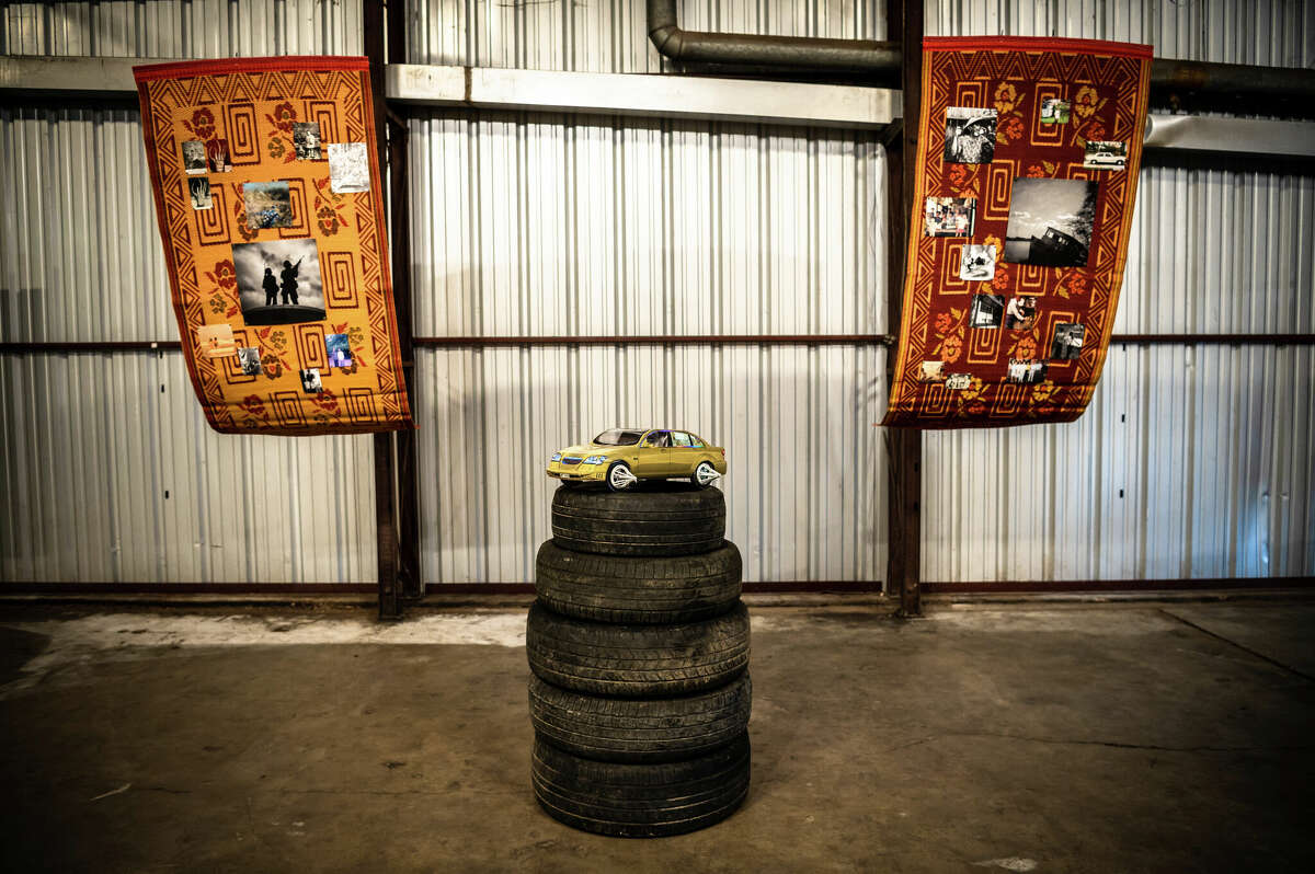 A pop-up art exhibition inside of an old warehouse that is owned by Concept Neighborhood, during a block party in the Second Ward in Houston, Texas on Saturday, November 5, 2022. Concept Neighborhood plans to rent the property as a creative or retail space, as part of their project to redevelop several blocks in the Second Ward in a socially conscious way that is pedestrian and bike-friendly and uplifts local residents and small businesses.