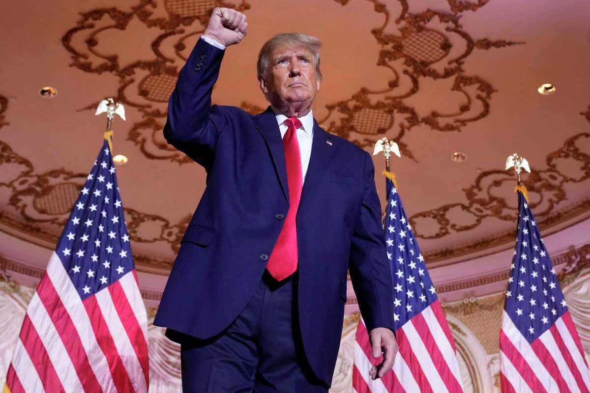 Former President Donald Trump gestures after announcing he is running for president for the third time as he speaks at Mar-a-Lago in Palm Beach, Fla., Tuesday, Nov. 15, 2022. (AP Photo/Andrew Harnik)