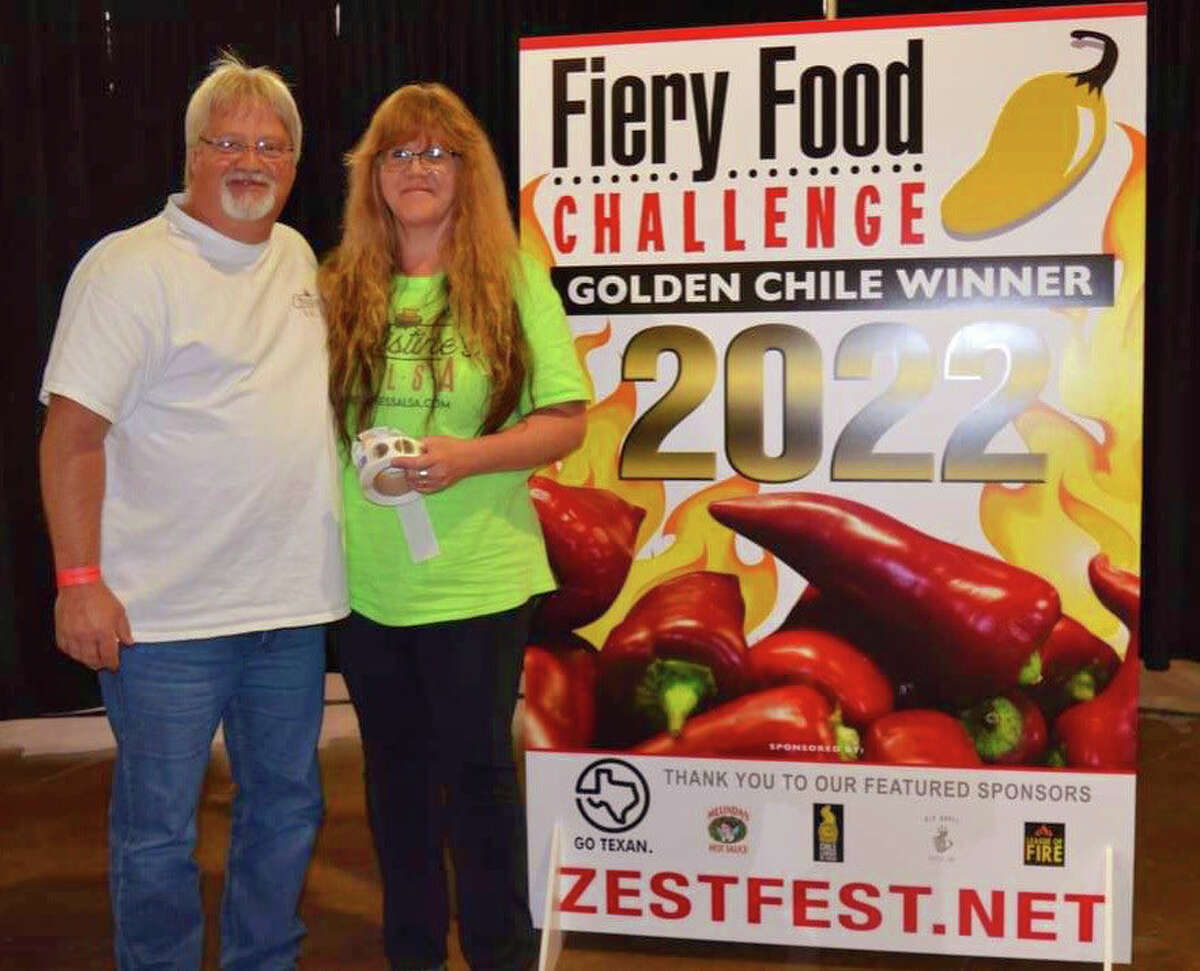 Christine Nelson, right, and her husband Wayne, left, at the ZestFest Fiery Food Challenge in Dallas, Texas.