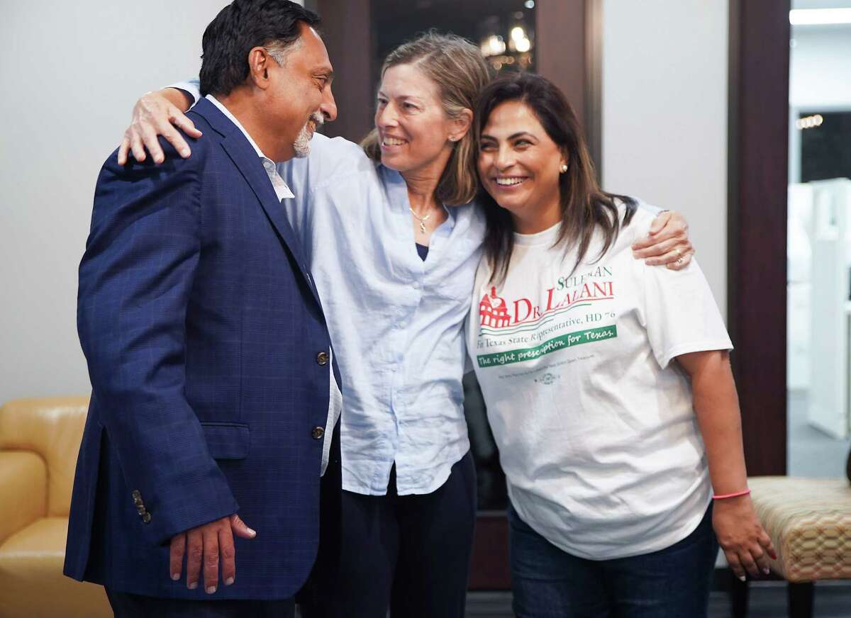 Texas Representative elect Dr. Suleman Lalani and his wife, Zakia, get a hug from supporter Carol Wetterauer after a small gathering with his supporters a week after his historic election on Tuesday, Nov. 15, 2022 in Sugar Land. “Having been a nurse, I’ve known him for years,” said the Katy resident. “Even though I didn’t live in his district, I knew I needed to volunteer.”