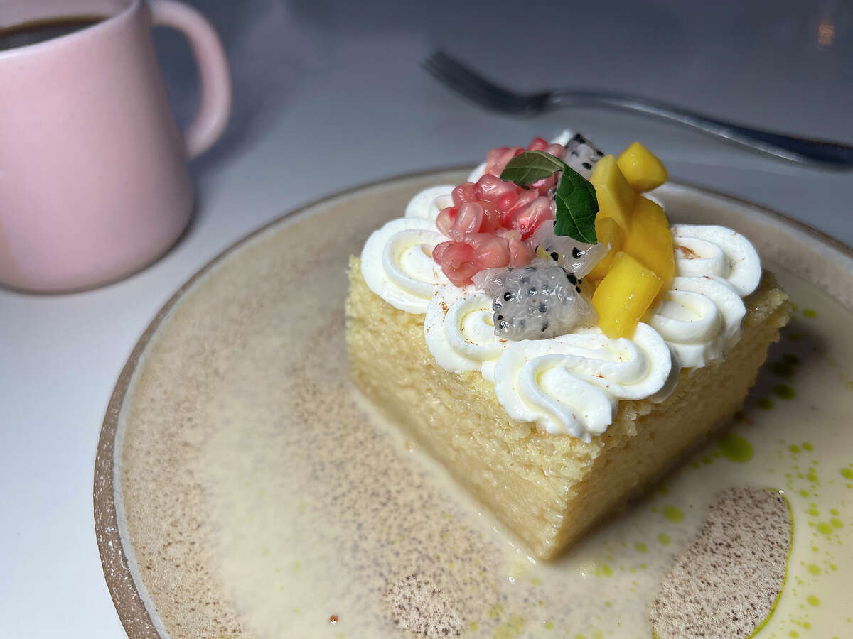 Desserts include tres leches cake with fruit at Carriqui at the Pearl in San Antonio. 