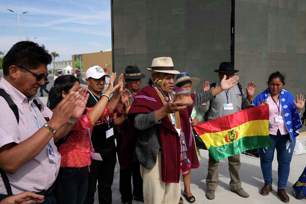 Activists from Bolivia participate in a demonstration at the COP27 U.N. Climate Summit, Thursday, Nov. 17, 2022, in Sharm el-Sheikh, Egypt. (AP Photo/Peter Dejong)