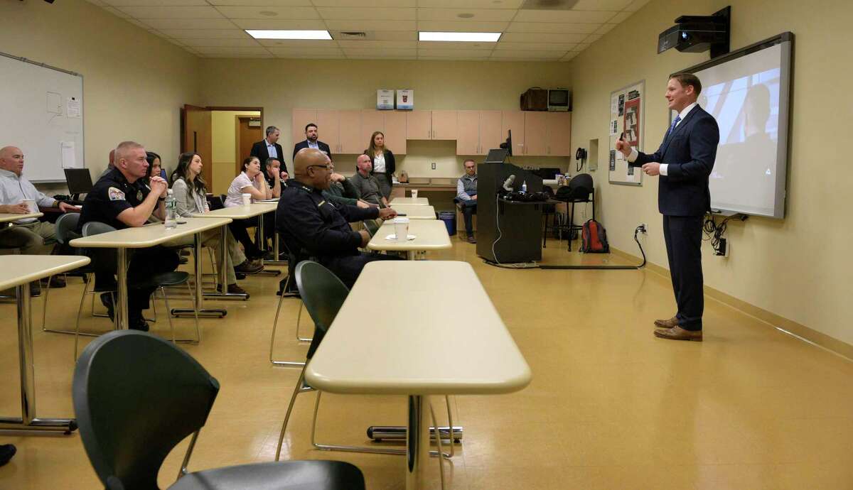 Clint Collins, VR Subject Matter Specialist, with Axon during a presumption    of their VR, virtual reality, grooming  to the Danbury Police Department connected  Thursday morning. It included taser simulator technology. November 17, 2022, Danbury, Conn.