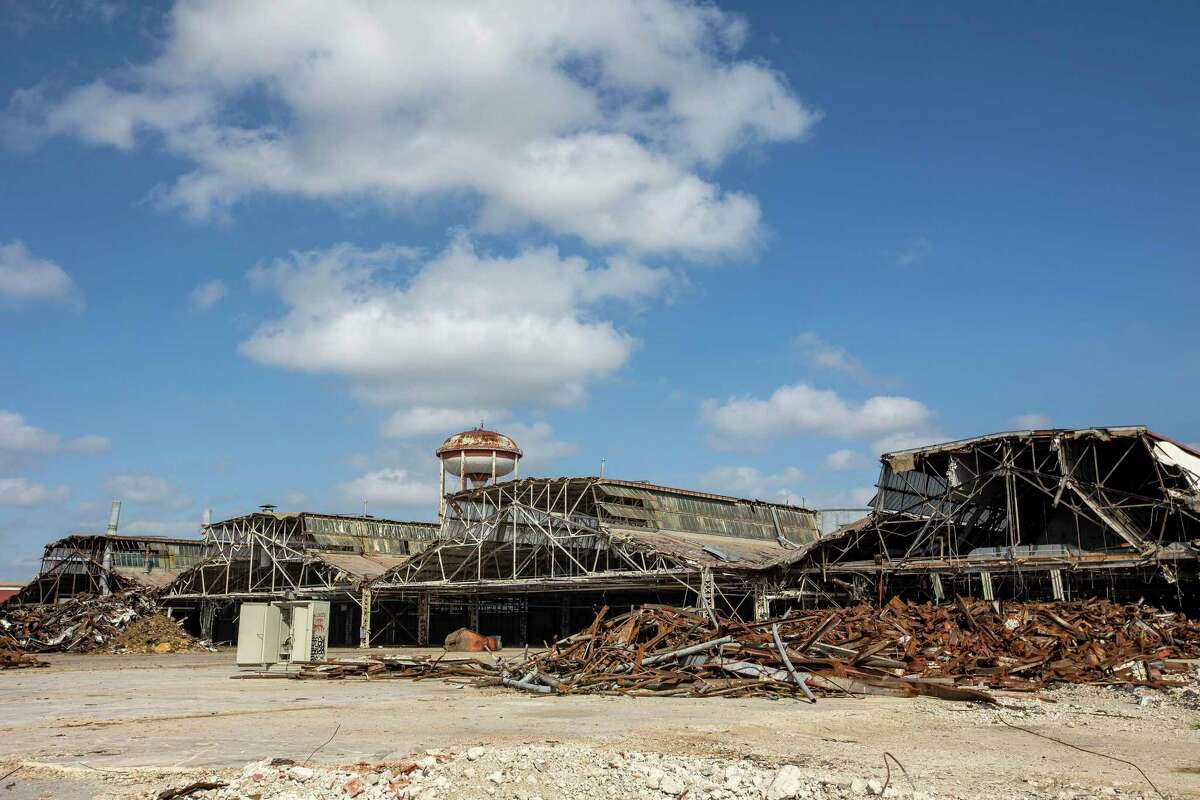 Demolition of the former Air Force hangar at the intersection of Old Street and Perrin Road at Port San Antonio is seen Thursday, Nov. 10, 2022.