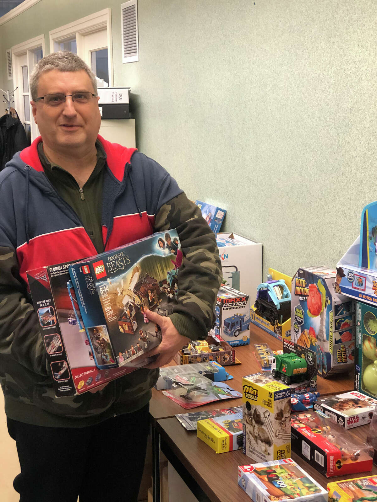 Vinny DiNatale, a Big Brother volunteer, is marking 10 years of hosting toy drives benefiting the families the organization serves.