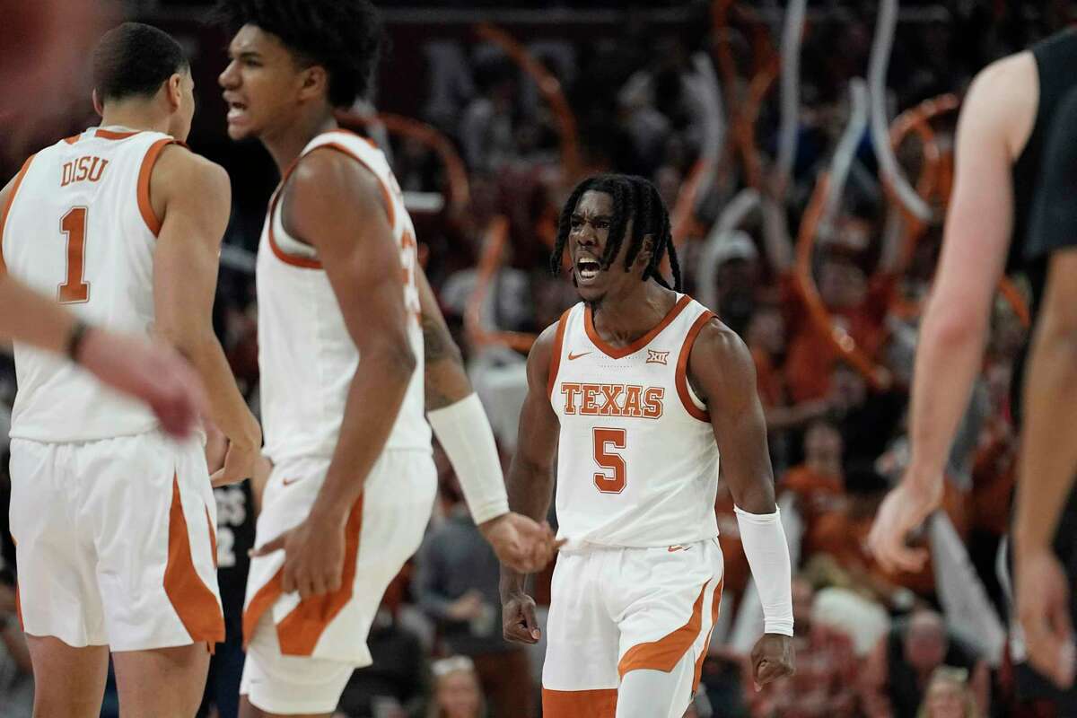 Texas guard Marcus Carr, center, celebrates a score during the Longhorns’ 19-point victory Wednesday over No. 2 Gonzaga.