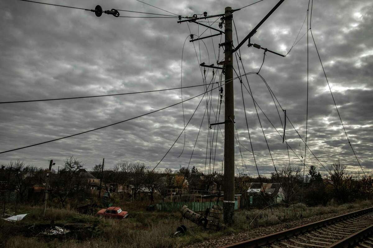 Downed electrical lines along the railway in the town of Prudyanka, Ukraine, which was occupied by Russian forces until retaken in September, on Wednesday, Nov. 2, 2022.