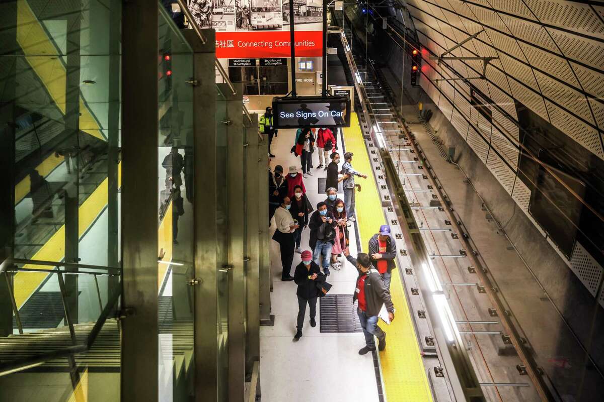 People explore the new Central Subway in San Francisco’s Chinatown in October.