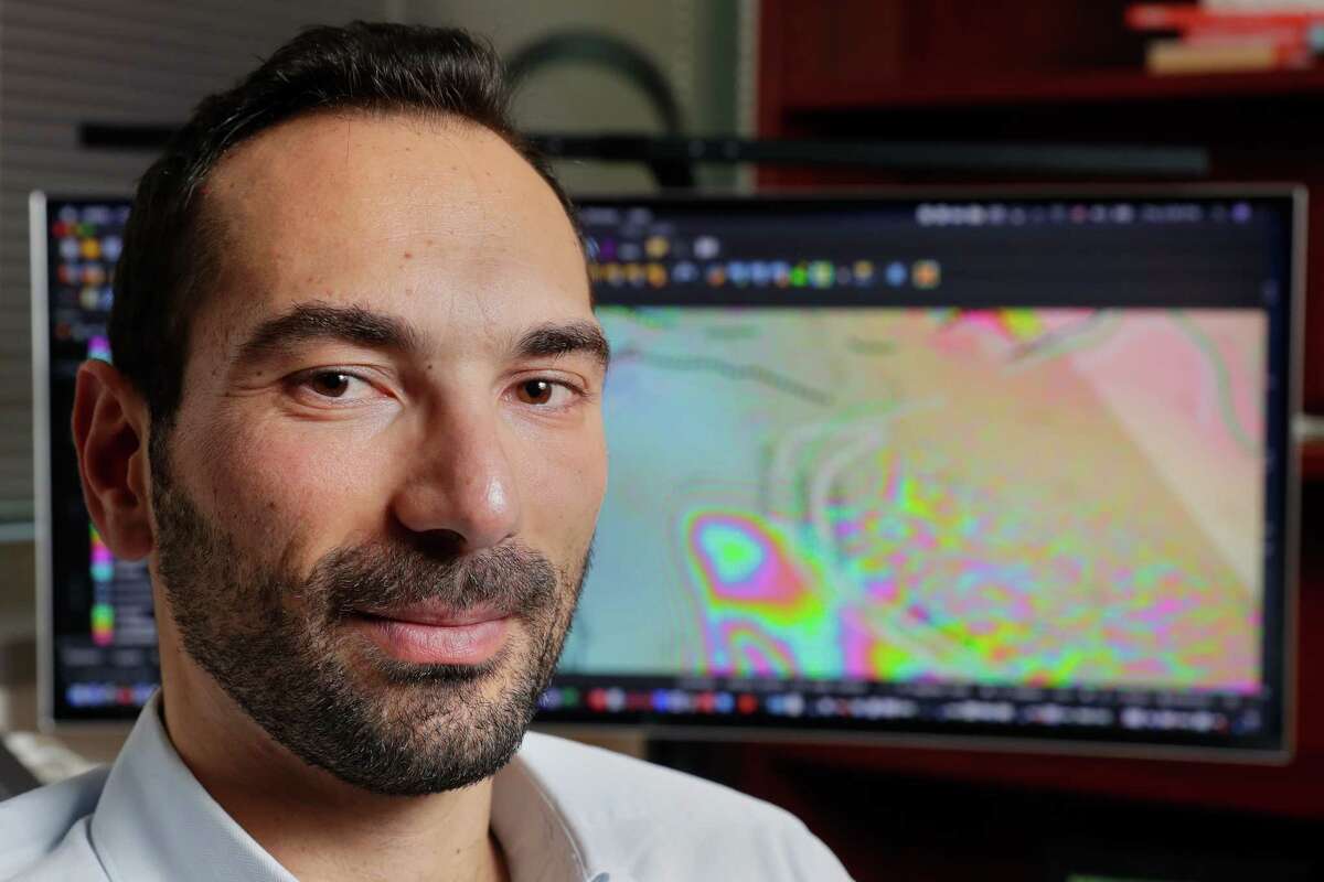 University of Houston researcher Pietro Milillo, who uses remote imaging techniques to study glacial melting rates, in his office at the university Thursday, Nov. 17, 2022 in Houston, TX.