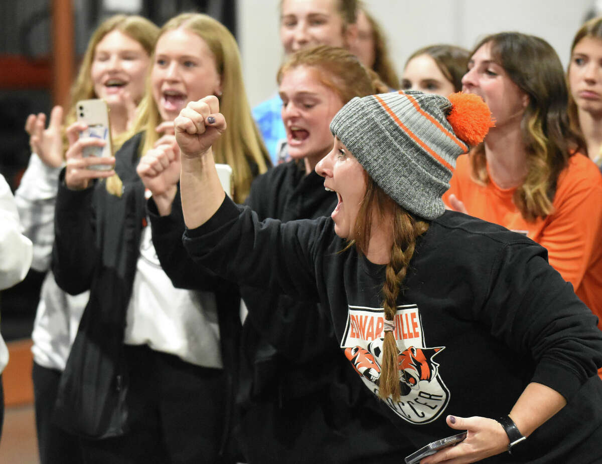 The Edwardsville wrestling team defeated the two-time defending champion girls soccer team in the 11th Annual Battle of the Bones chicken wing eating contest on Thursday inside the Jon Davis Wrestling Center in Edwardsville. The contest is part of a fundraising event, which includes pork steak dinners, for both programs.