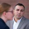 Steven Rountos, a former Brookfield school resource officer who resigned while under internal investigation last year, after appeared in Danbury Superior Court Friday morning, with his attorney Nicolle Lipkin. Friday, November 18, 2022, Danbury, Conn.