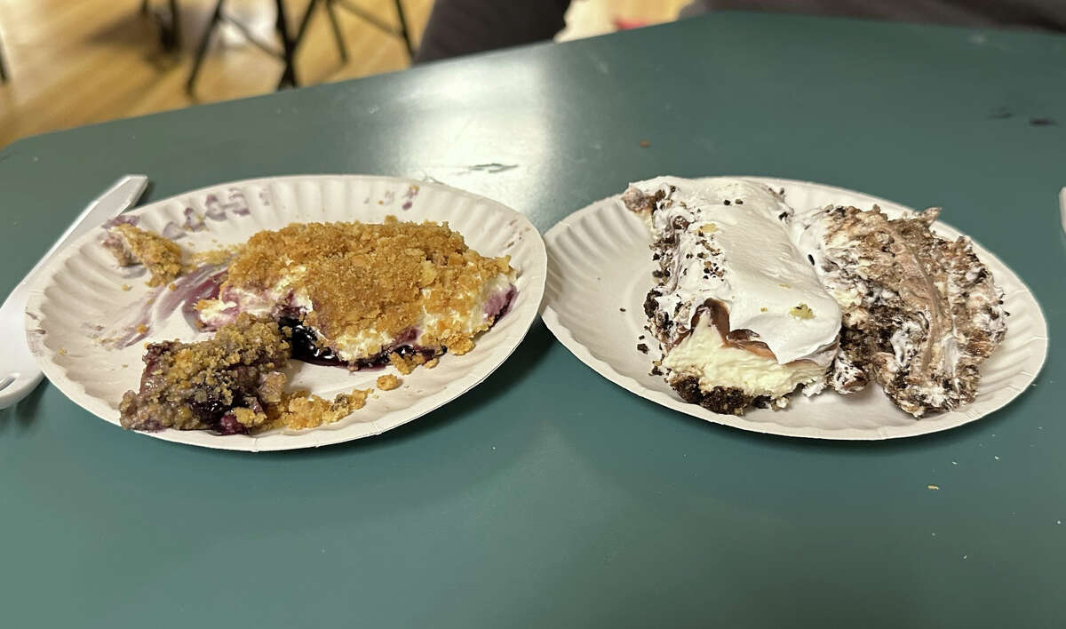 Tribune writers Mark Birdsall and Tom Greene loosened their belts and reunited with the hunter's buffet at Biff's Bar and Grill in Kinde on the opening day of gun season. Above, Tom Greene struggled to choose which dessert he wanted, so he chose both.
