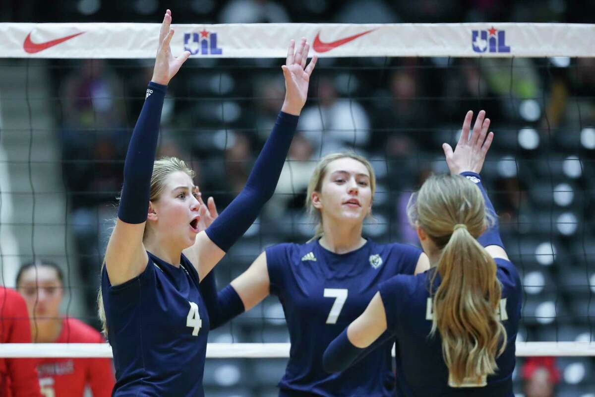 Lake Creek's Payton Woods (4) reacts after scoring a point in the third set of a Class 5A state semifinal match during the UIL State Championships at the Curtis Culwell Center, Thursday, Nov. 18, 2022, in Garland.