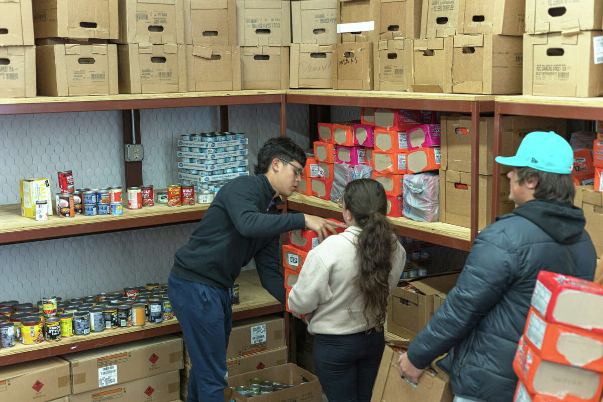 Students store the food collected in the FISH holding area 