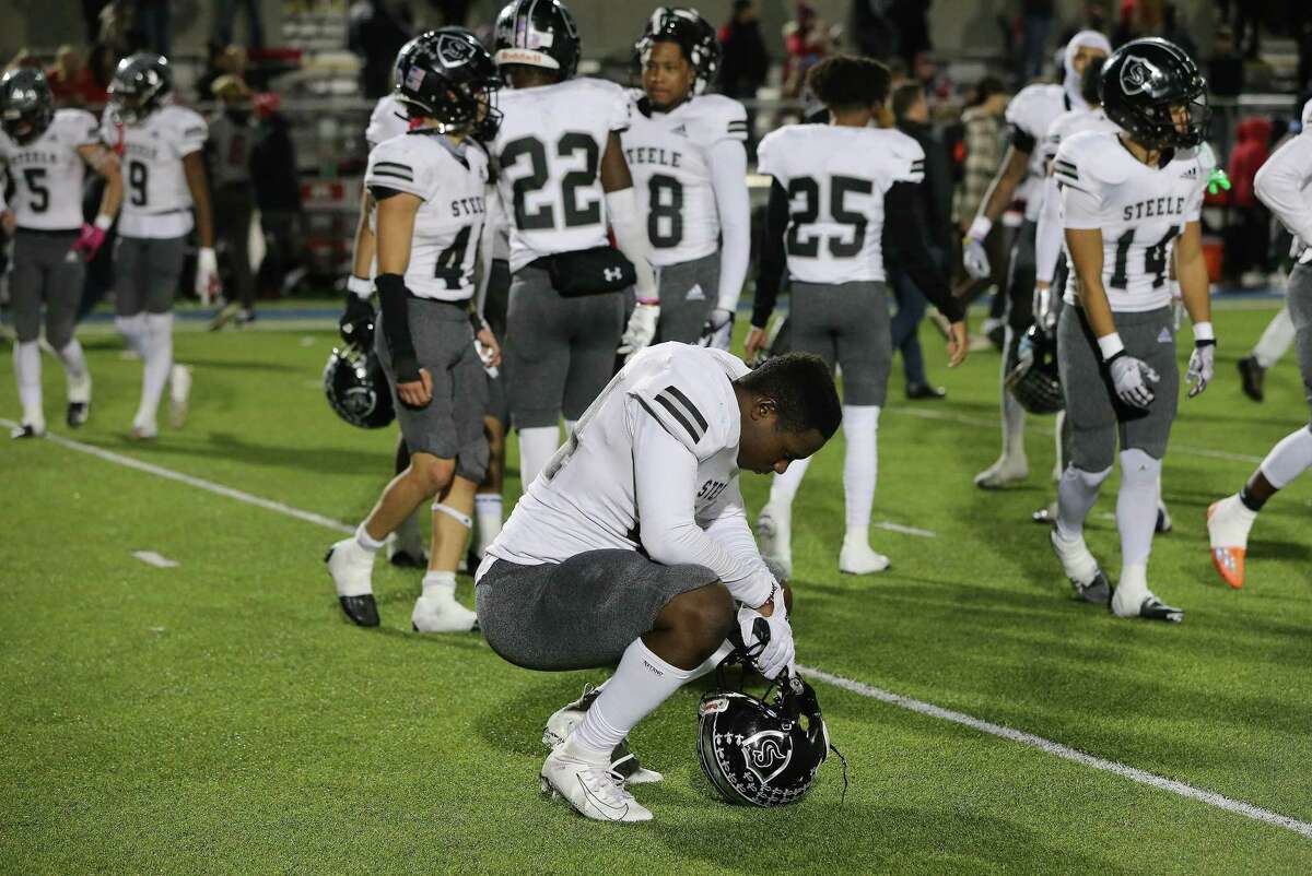 Steele’s Kiki Adejuyigbe (44) shows the impact of the loss to Lake Travis at the end of thei high school football playoff game in Plugerville on Friday, Nov. 18, 2022. Lake Travis defeated Steele, 24-21.