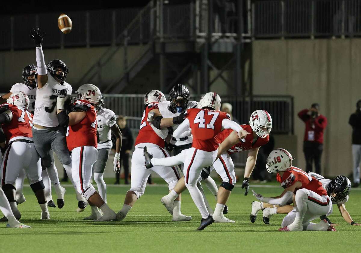 Lake Travis kicker Hunter Rioux (47) kicks the winning field goal against Steele as time runs out during their high school football playoff game in Plugerville on Friday, Nov. 18, 2022. Lake Travis defeated Steele, 24-21.