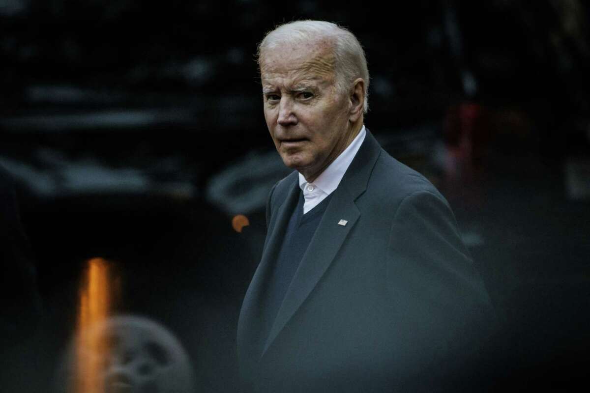 President Joe Biden leaves Holy Trinity Catholic Church before attending the Phoenix Awards Dinner in Washington, D.C., on Oct. 1, 2022.