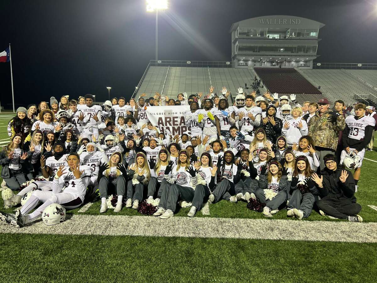 The Silsbee football team poses after an area-round win Friday night over Smithville.