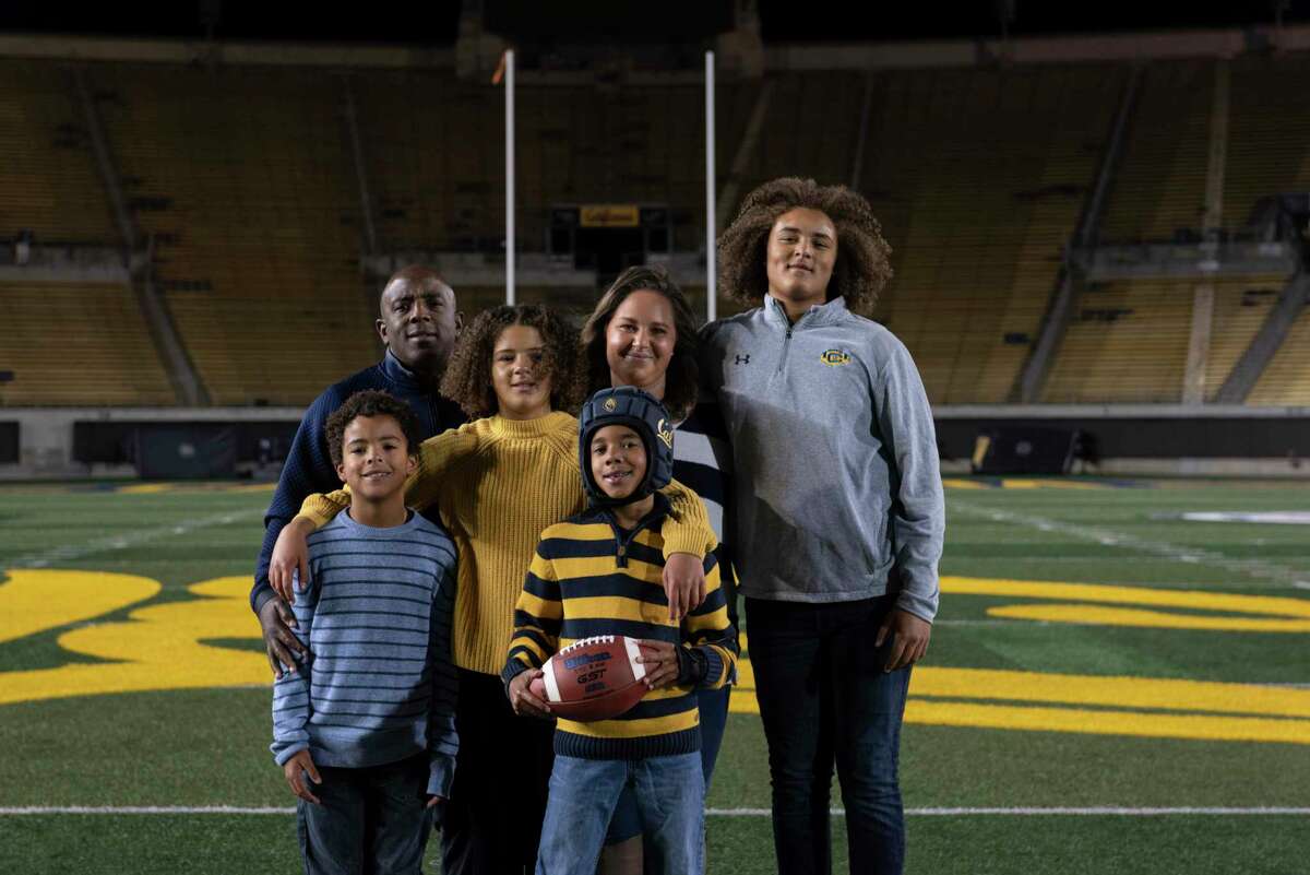 The Thompson family gathers for a portrait at Memorial Stadium in Berkeley.