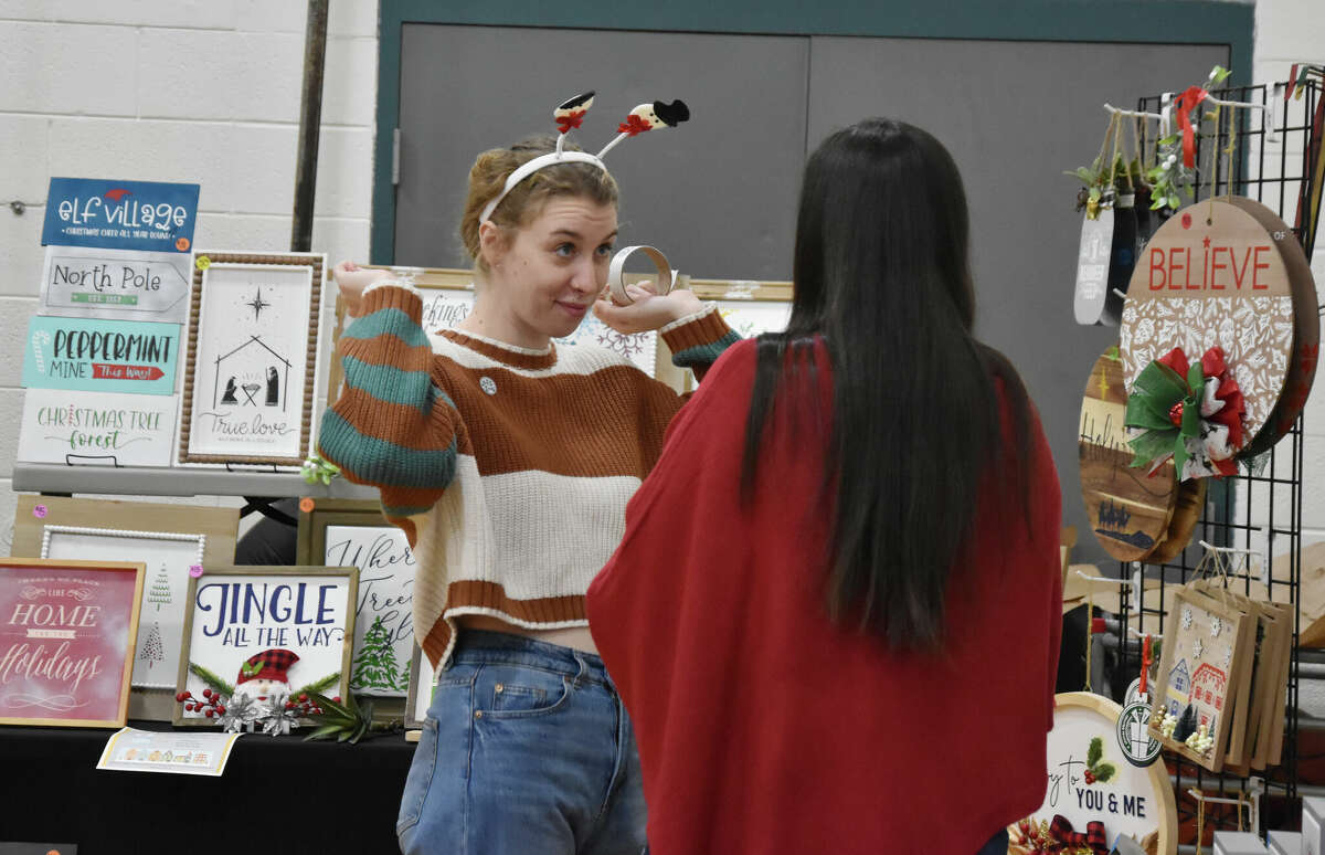 Patrons had a chance to try on holiday crafts at the Christmas in Onekama event on Saturday. 
