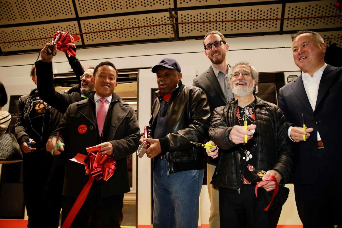 San Francisco City Attorney David Chiu (left), former San Francisco Mayor Willie Brown, State Senator Scott Wiener, Supervisor Aaron Peskin and Assemblyman Phil Ting attend the ribbon cutting ceremony for the new subway line.