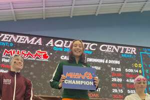 State champ!: Dow's Roberson wins 100 freestyle title