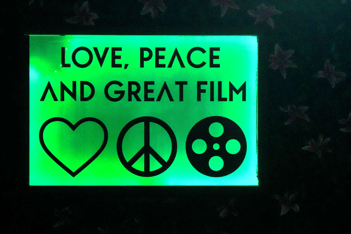 An LED sign near the entrance to the Rooftop Cinema Club 