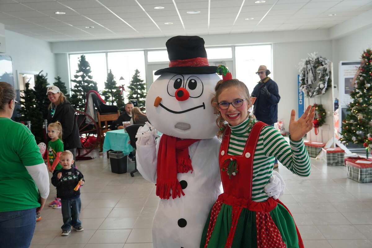 Madelyn Linznei came to help both Frosty and Santa Clause for Sebewaing's Spirit of Chrsitmas.