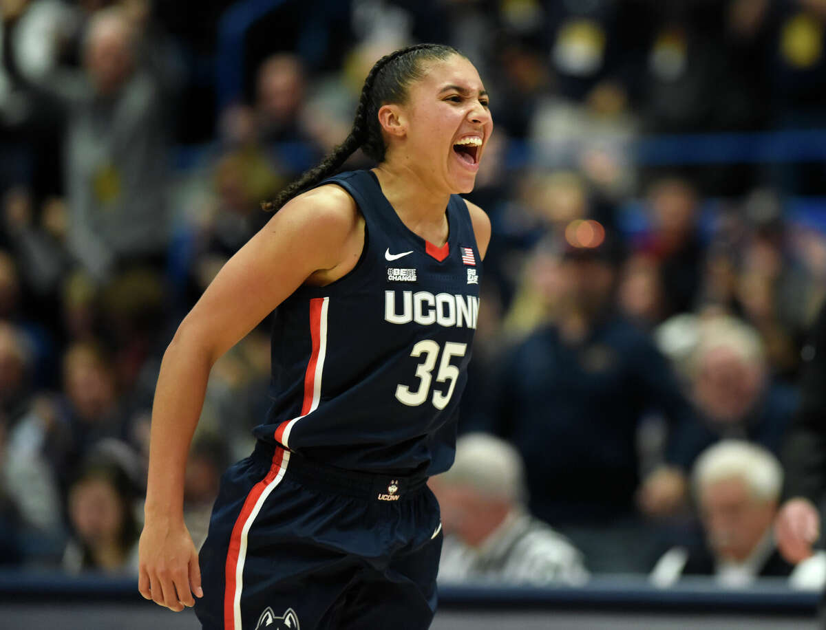 UConn guard Azzi Fudd celebrates in No. 5 UConn's 91-69 win over No. 10 NC State in the NCAA women's college basketball game at the XL Center in Hartford, Conn. Sunday, Nov. 20, 2022.
