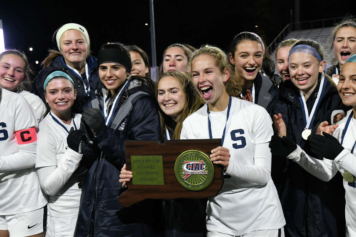 Staples celebrates their win over Cheshire in the Class LL girls soccer state championship at Trinity Health Stadium on Sunday, Nov.  30, 2022.