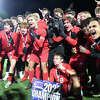 Cheshire celebrates after beating Xavier in the Class L boys soccer championship game at Trinity Health Stadium on Sunday, Nov. 20, 2022.