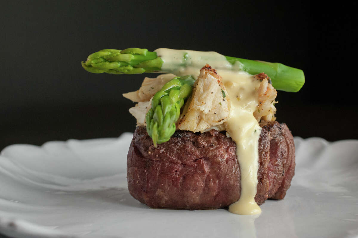 A grilled filet topped with jumbo lump crab meat and Hollandaise sauce at Taste of Texas in Houston