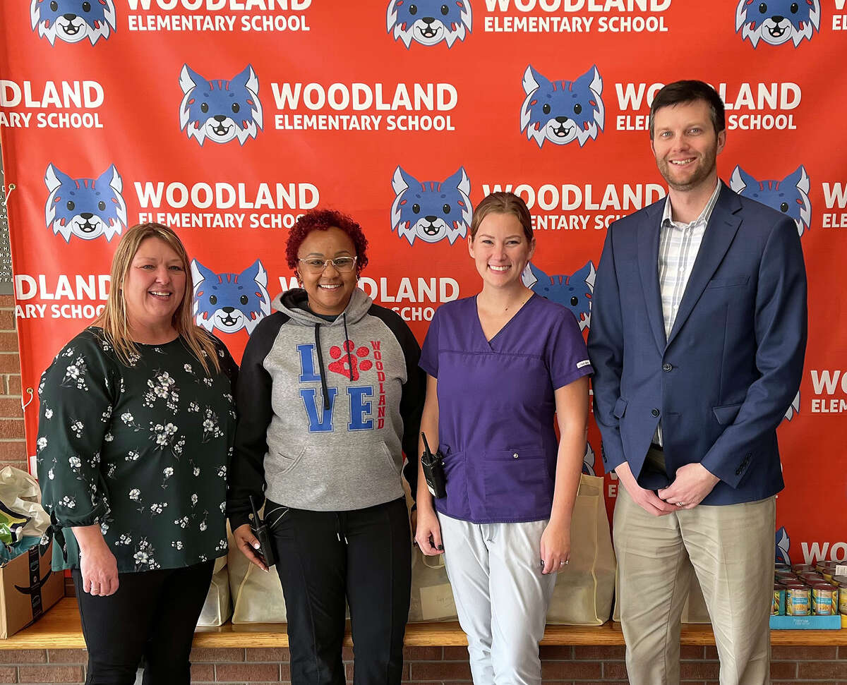 From left are Christine Doty, Edwardsville Township Community Outreach Coordinator; Kelli Pirtle, Woodland Elementary Principal; Morgan Walker, Woodland Nurse; and Kevin Hall, township supervisor.