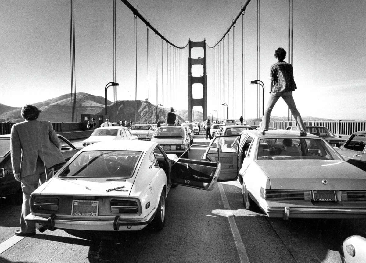 June 3, 1980: Commuters can only stand and watch as a traffic jam forms on the Golden Gate Bridge. This beautiful image was taken by longtime Chronicle photographer and photo editor Gary Fong.