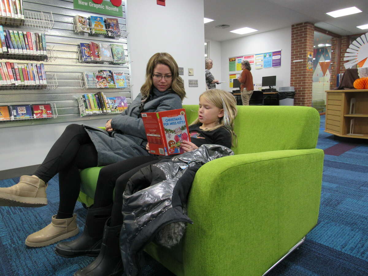Midland area residents read at the Grace A. Dow Memorial Library on Nov. 17, 2022 in Midland. 
